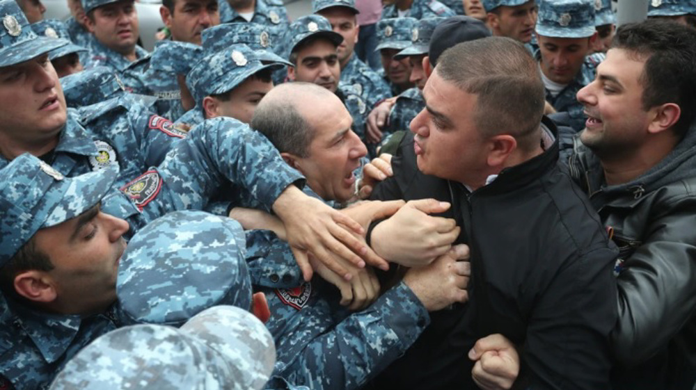 Armenian police arrest dozens of protesters calling for PM to resign