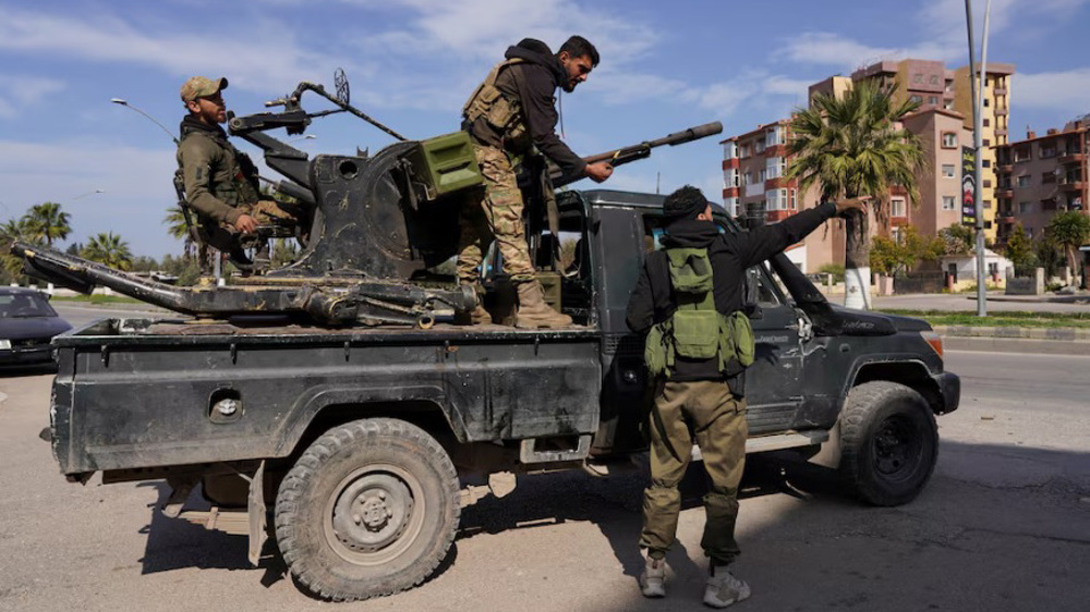 HTS gunmen, allied militants kill over dozen Alawites in Syria’s Homs