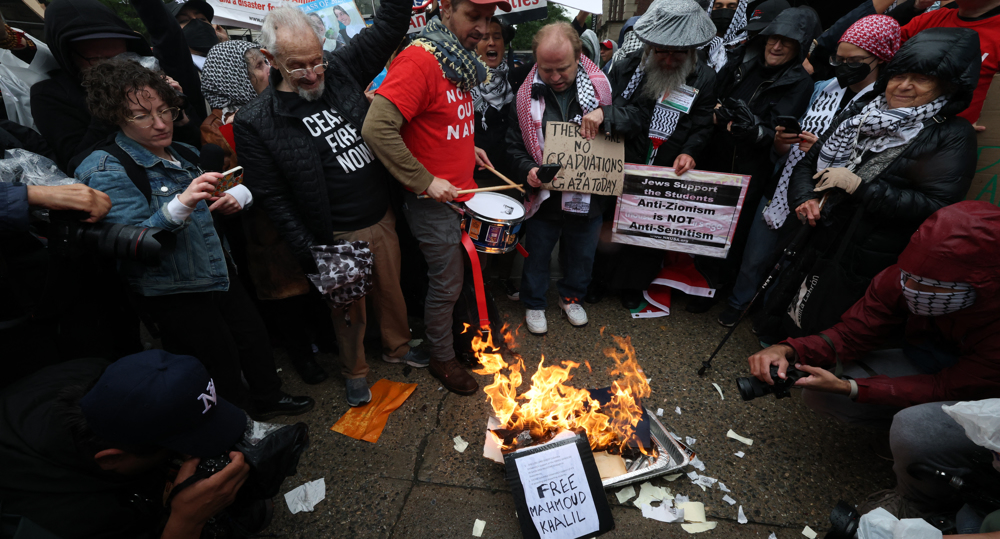 Pro-Palestinian protesters torch diplomas outside Columbia University 